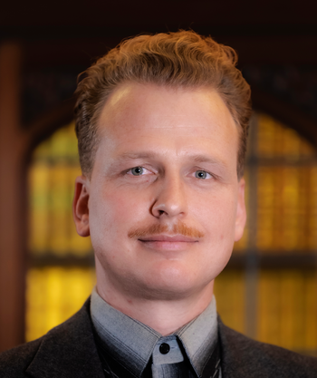 Portrait of speaking man with microphone