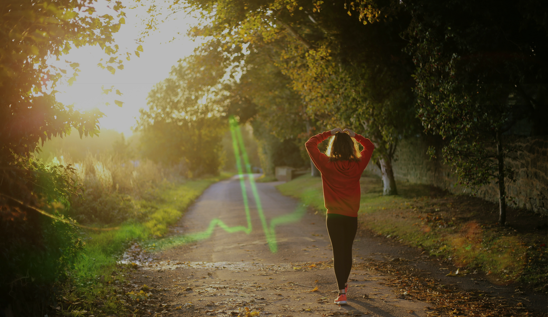 Photo of woman walking in the forest with a heartbeat visual 